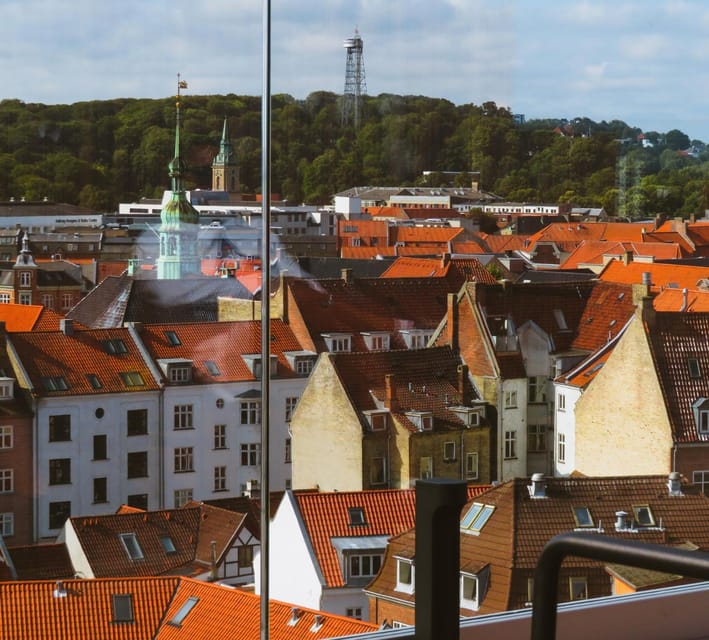 Aalborg: Express Walk with a Local in 60 minutes - From Landmark to Local Life at the House of Music
