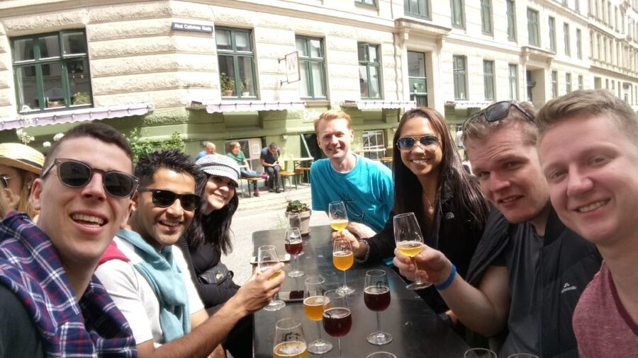 Copenhagen: 3-Hour Culinary Bike Tour - A market stop for fish cake, rye bread, and beer