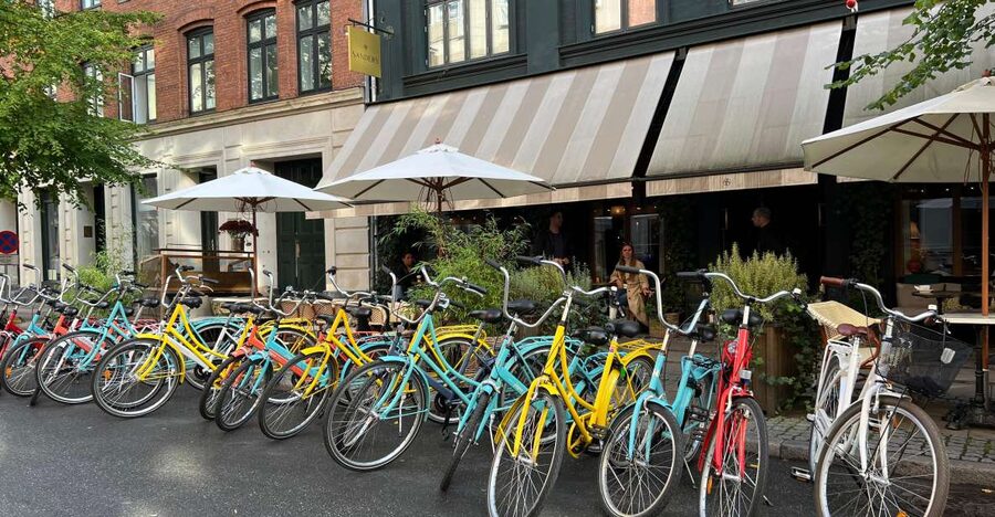 Copenhagen: City Highlights Guided Bike Tour - Small groups, headsets, and the pace of the ride