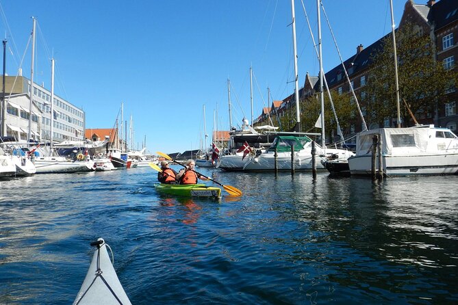 Kayak Tour in Copenhagen Harbor in May and September - Under the bridge and into the canals
