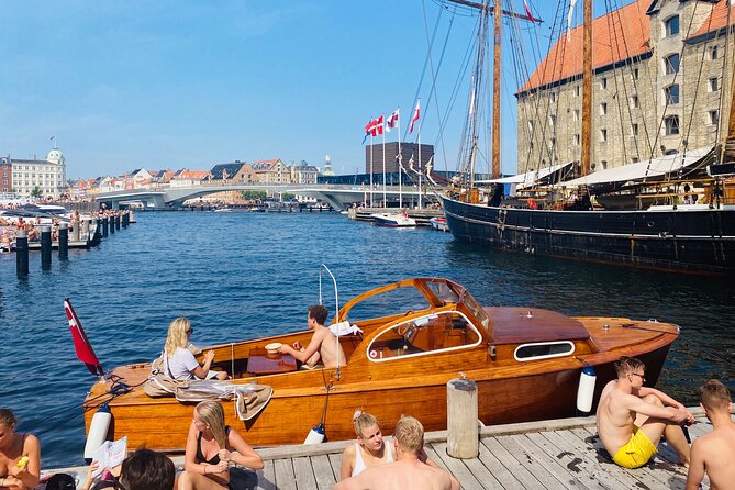 Private Copenhagen Boat cruise in Scandinavian mahogany boat - Christianshavns Kanal and the houseboat views