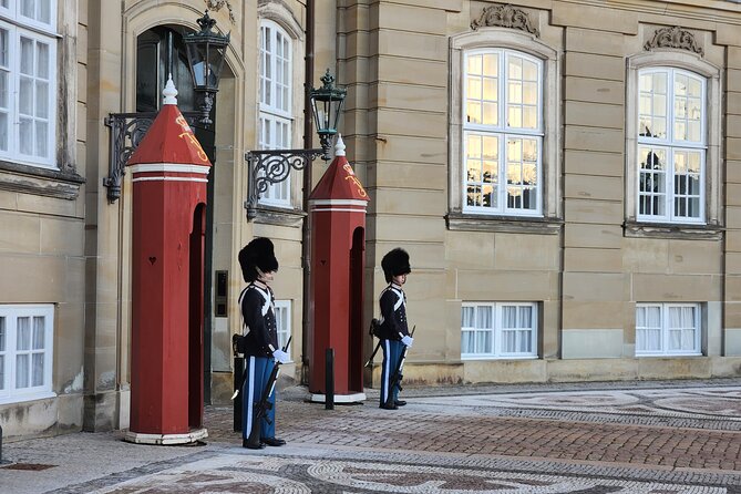 Walk & Canal Tour: Copenhagen Highlights + Changing of the Guards - Starting under the clock at Copenhagen Central Station