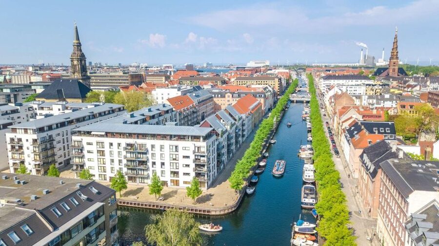 WWII Copenhagen Nyhavn and War Museum Private Walking Tour - Walking from Nyhavn toward Nyholm